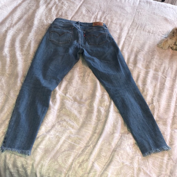 711 skinny jeans size 26 ripped